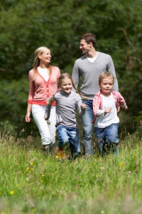 Family On Walk In Countryside